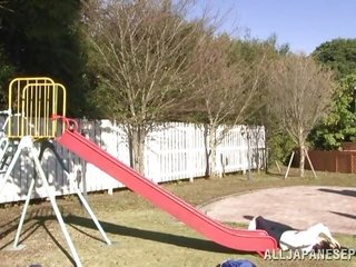 Japanese MILF gets double penetrated on playground