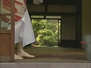 Japanese MILF gets naughty in the bedroom